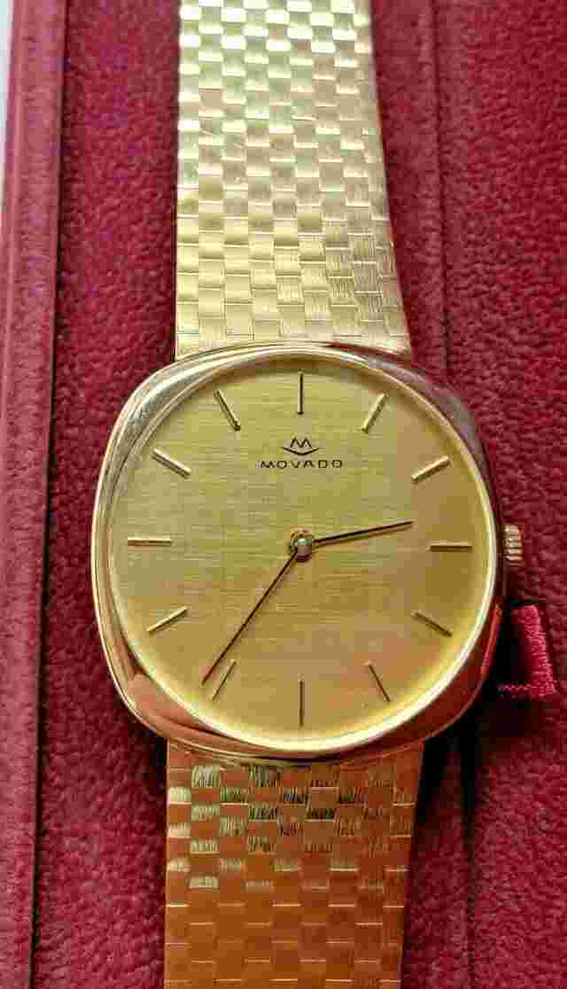 Movado Zenith 14k Mens wristwatch    windup mechanical movement.  87 GRAMS