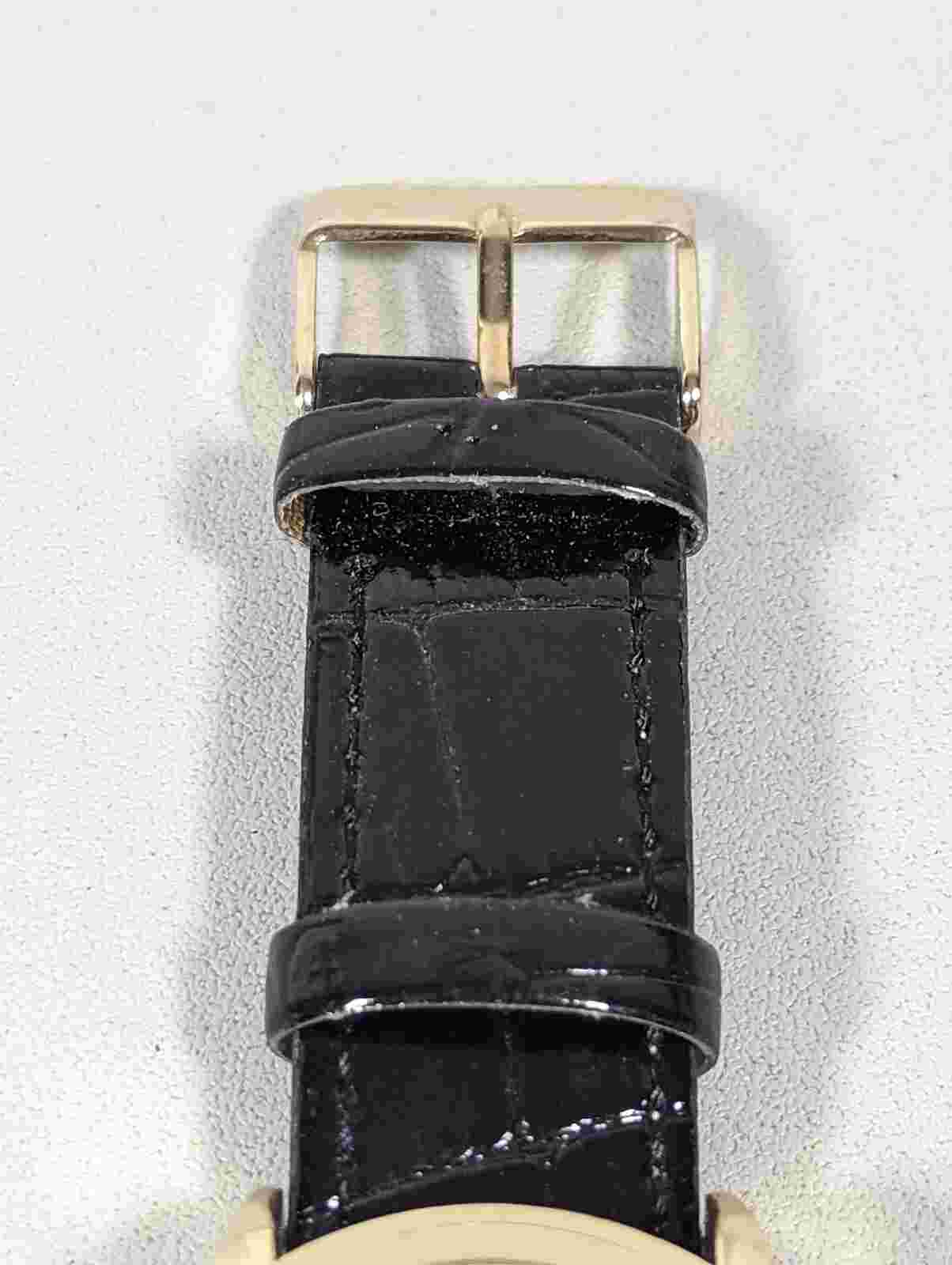 XOXO Gold Tone Dial Round Case Black Faux Leather Band Watch