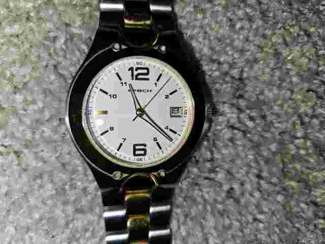 Epoch Men's Watch with Gold & Silver Color Band Very light use. Fresh battery.
