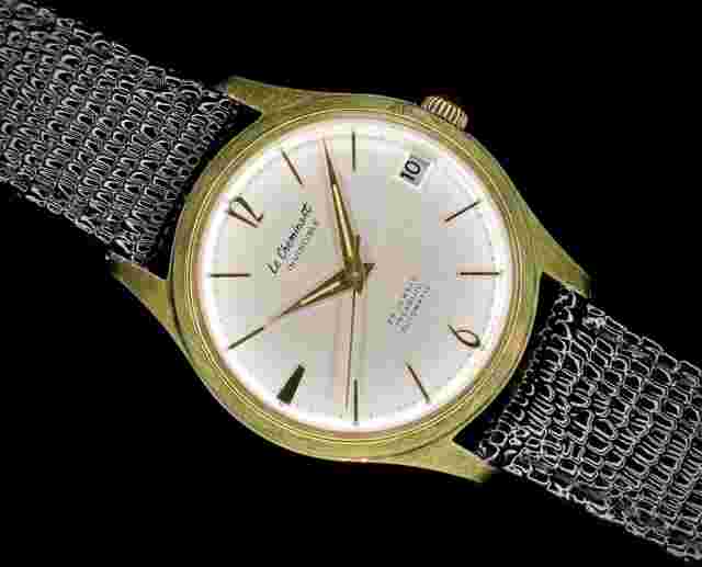 1960s Le Cheminant Invincible gold plated automatic date watch, Felsa 4700N