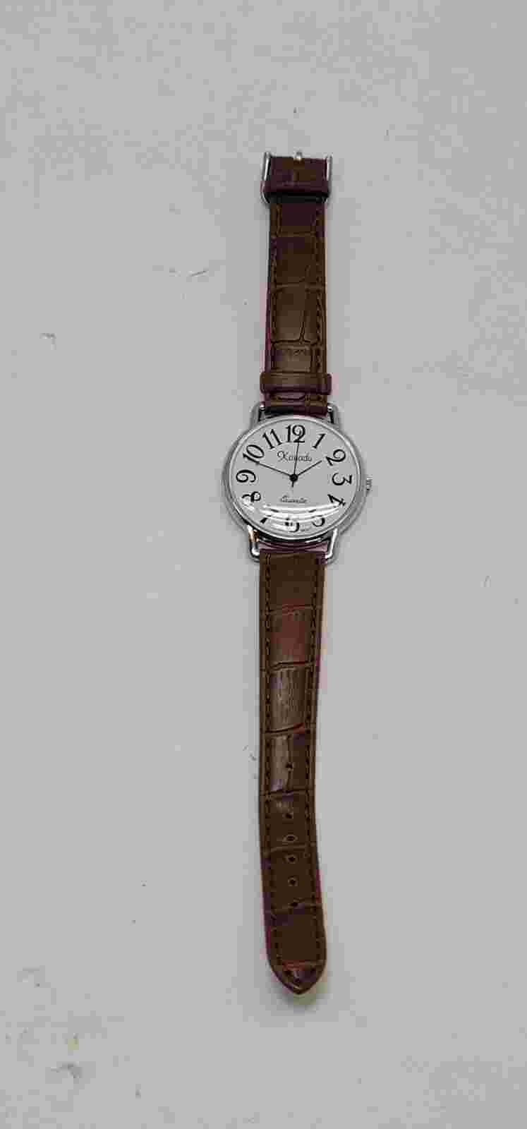 Xanadu White Dial Round Silver Tone Case White Stitch Brown Leather Band Watch