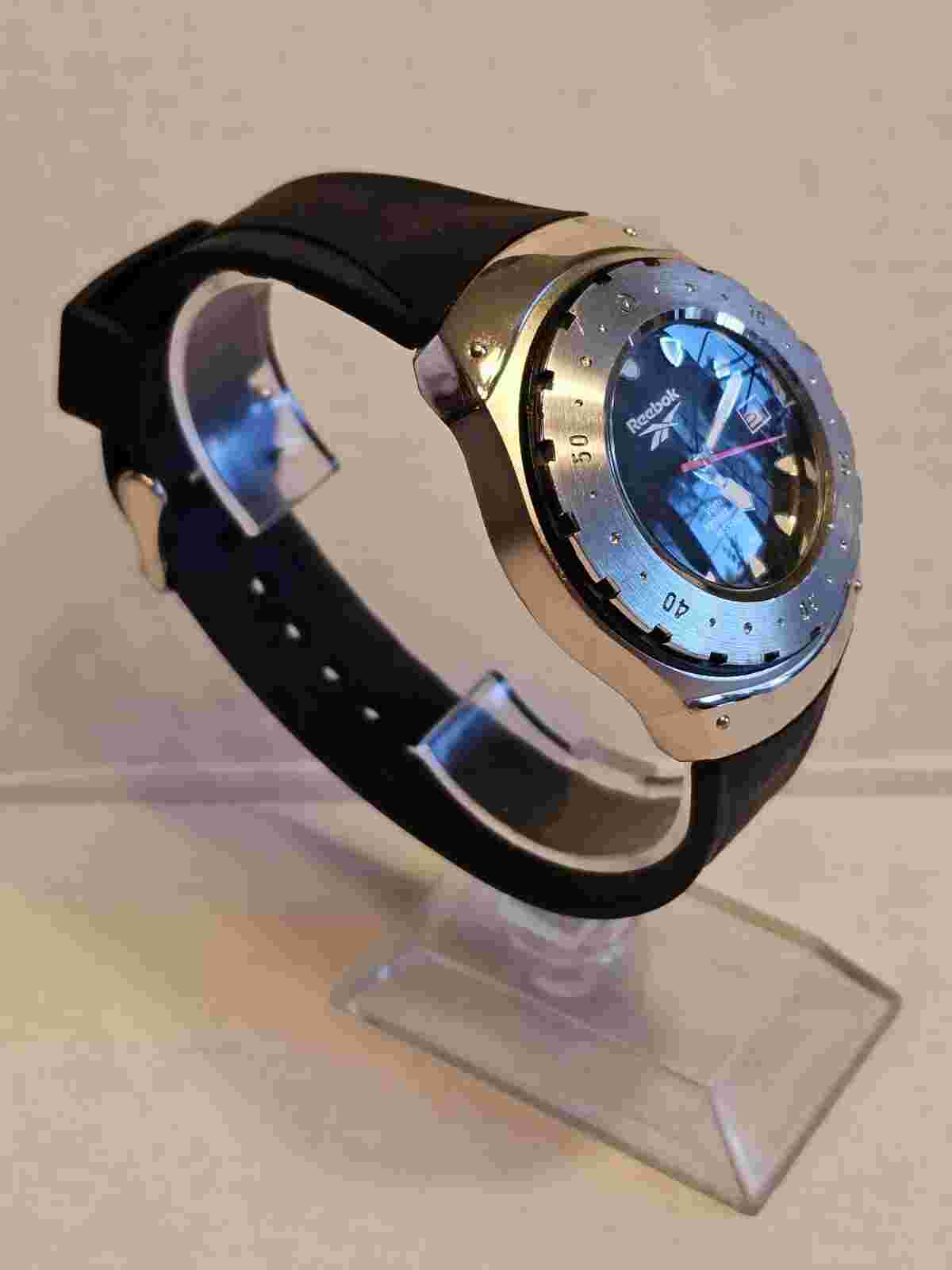Reebok Analog Mens Sports Date Watch With Rubber Strap And Japanese Movement