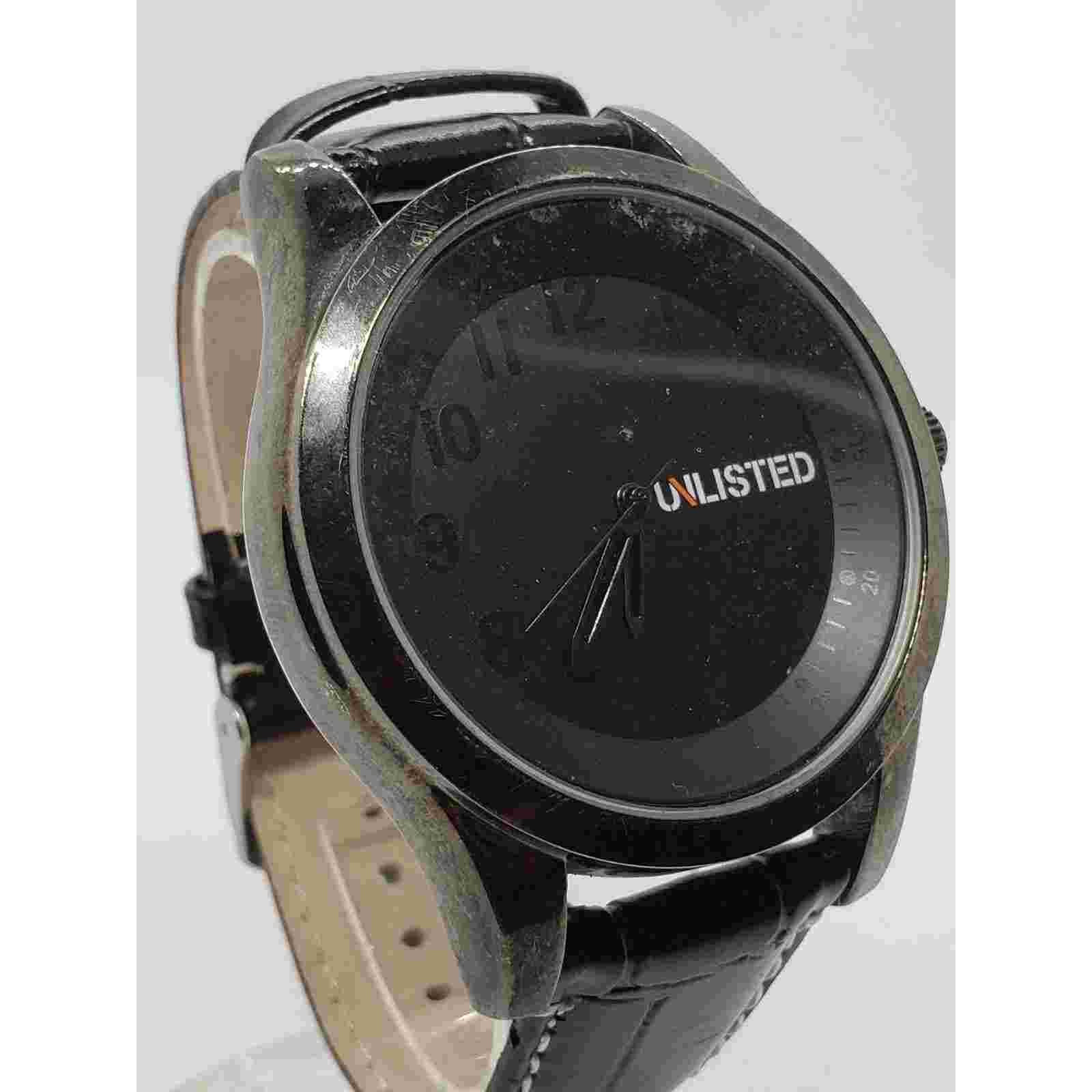 Unlisted Kenneth Cole UL1288 A126-14. Large black on black face, working watch