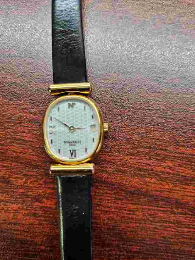 Nina Ricci Paris Ladies Watch Gold Tone with Black Leather Band