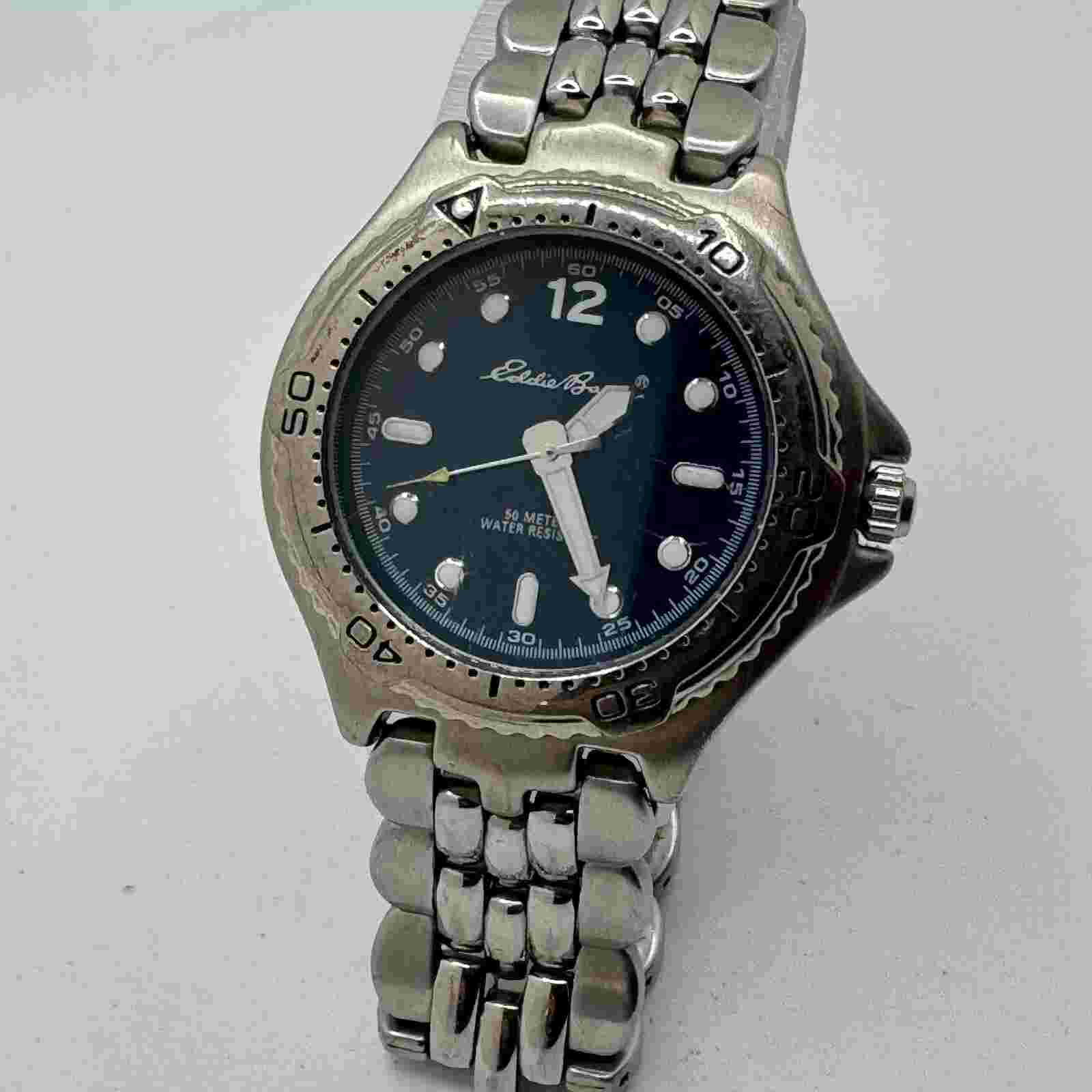 Eddie Bauer Quartz Watch Men Silver Blue Rotating Bezel Analog New Battery 7.5"