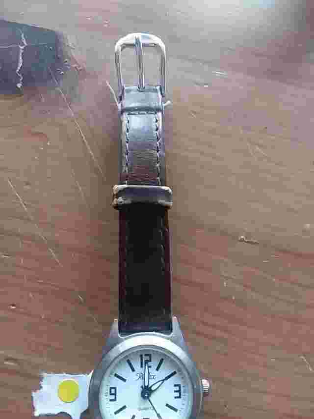 reflex ladies Watch running with a new battery & in med to good condition