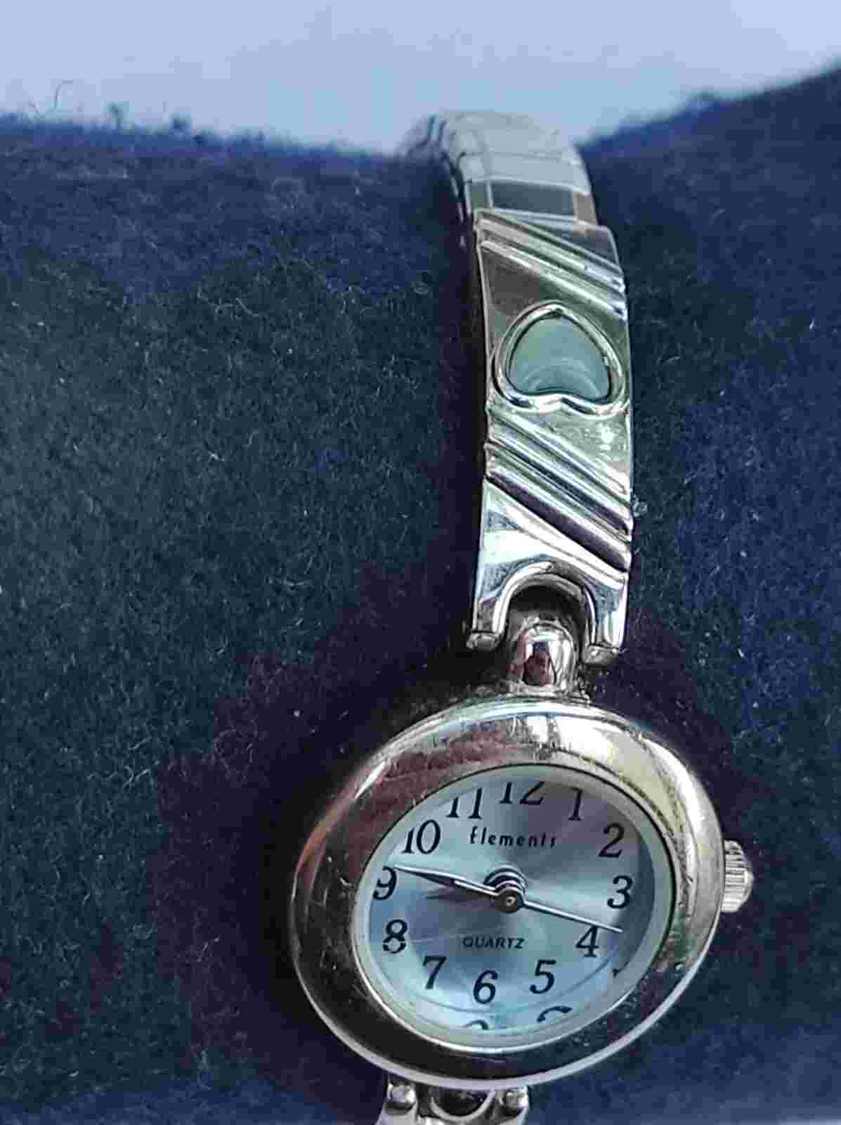 Elements women's silver tone shiny dial quartz bracelet watch