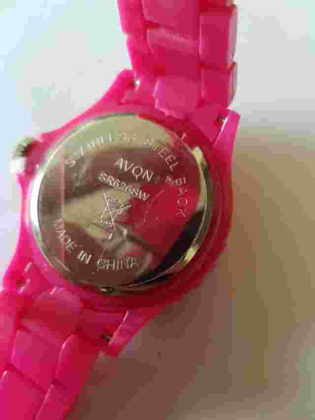 AVON PINK WATCH, STAINLESS STEEL BACK, IN NEED OF REPAIR/BATTERIES