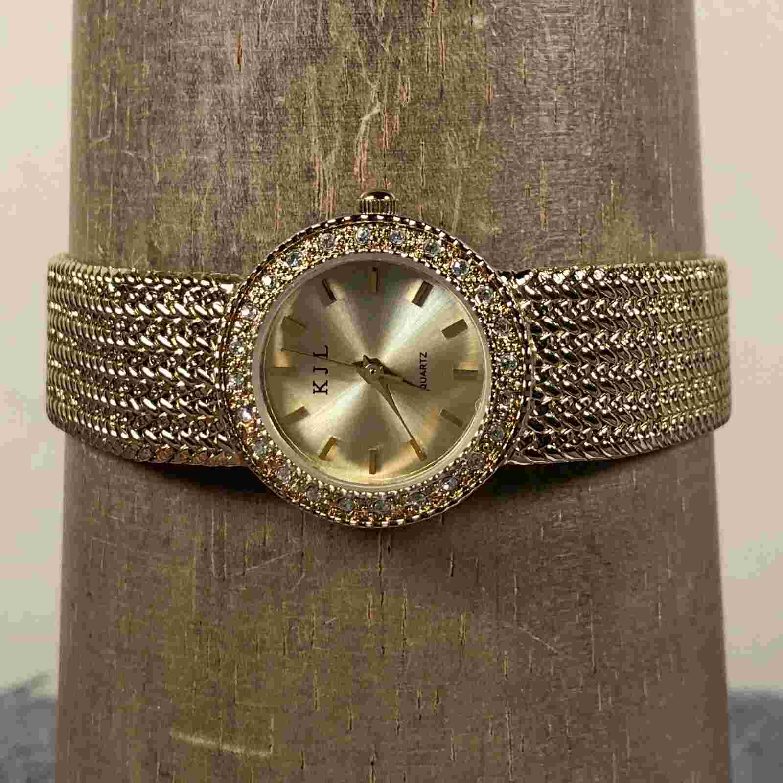 Kenneth Jay Lane Women Dress Pave Gold Tone Round 25mm Quartz Analog Watch 8"