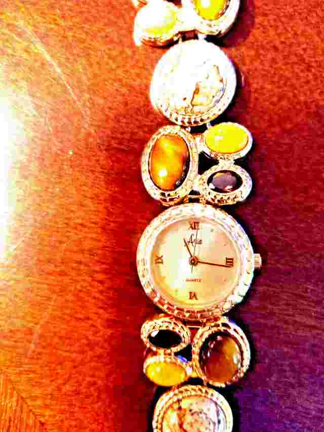 ARIA GOLD-TONED WITH VARIOUS STONES IN BAND WOMAN'S WATCH