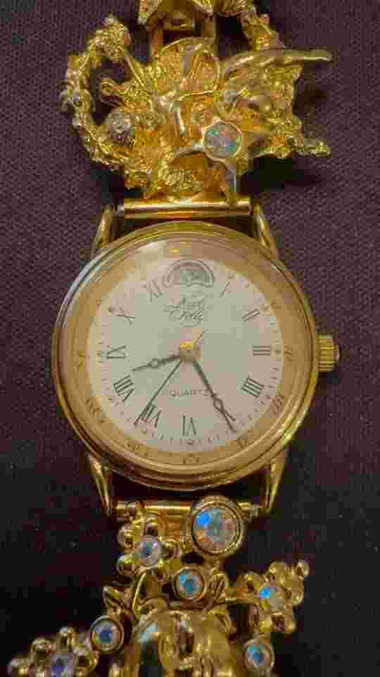 Vintage Kirks Folly Gold Tone Moon Phase Celestial Charm Watch w/Moons & Stars