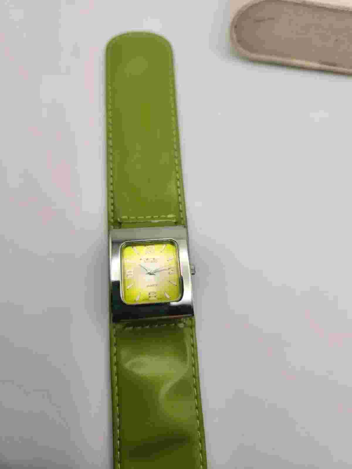 Milano Women's Quartz Watch.  Watch Wrappers Model, Green Strap.  A18