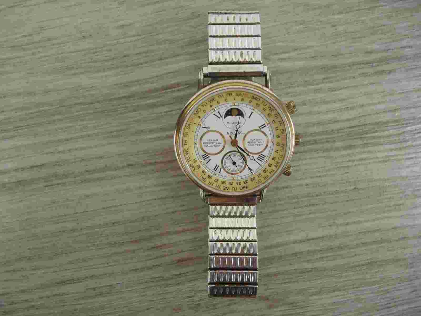 VTG Axcess Lunar Perpetual Calendar Watch Silver Band Anthropomorphic Sun