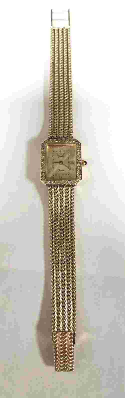 14kt yellow gold Crown Ladies diamond  wristwatch.  Swiss quartz  movement.