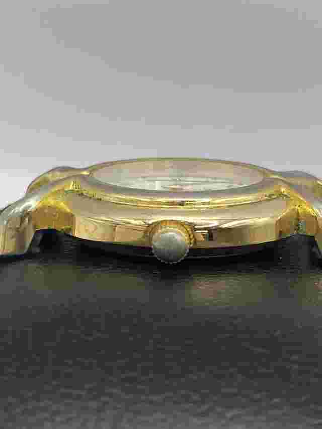 Broken Ladies Gold Toned  Circular Reflex Watch With Black Worn Leather Strap