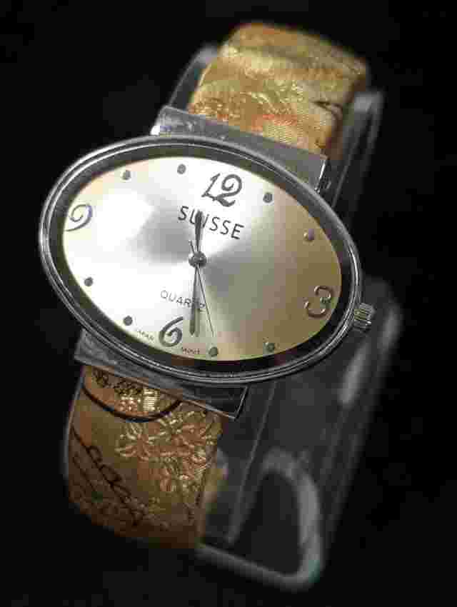 Suisse Gold Tone Dial Silver Tone Oval Case Hinge Bracelet Band Watch