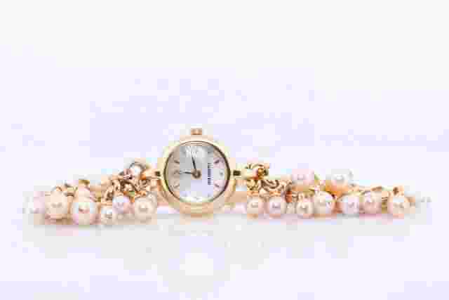 Mikimoto Watch. Mikimoto Pearl Dangle Bracelet Ladies Watch. MOP Dial