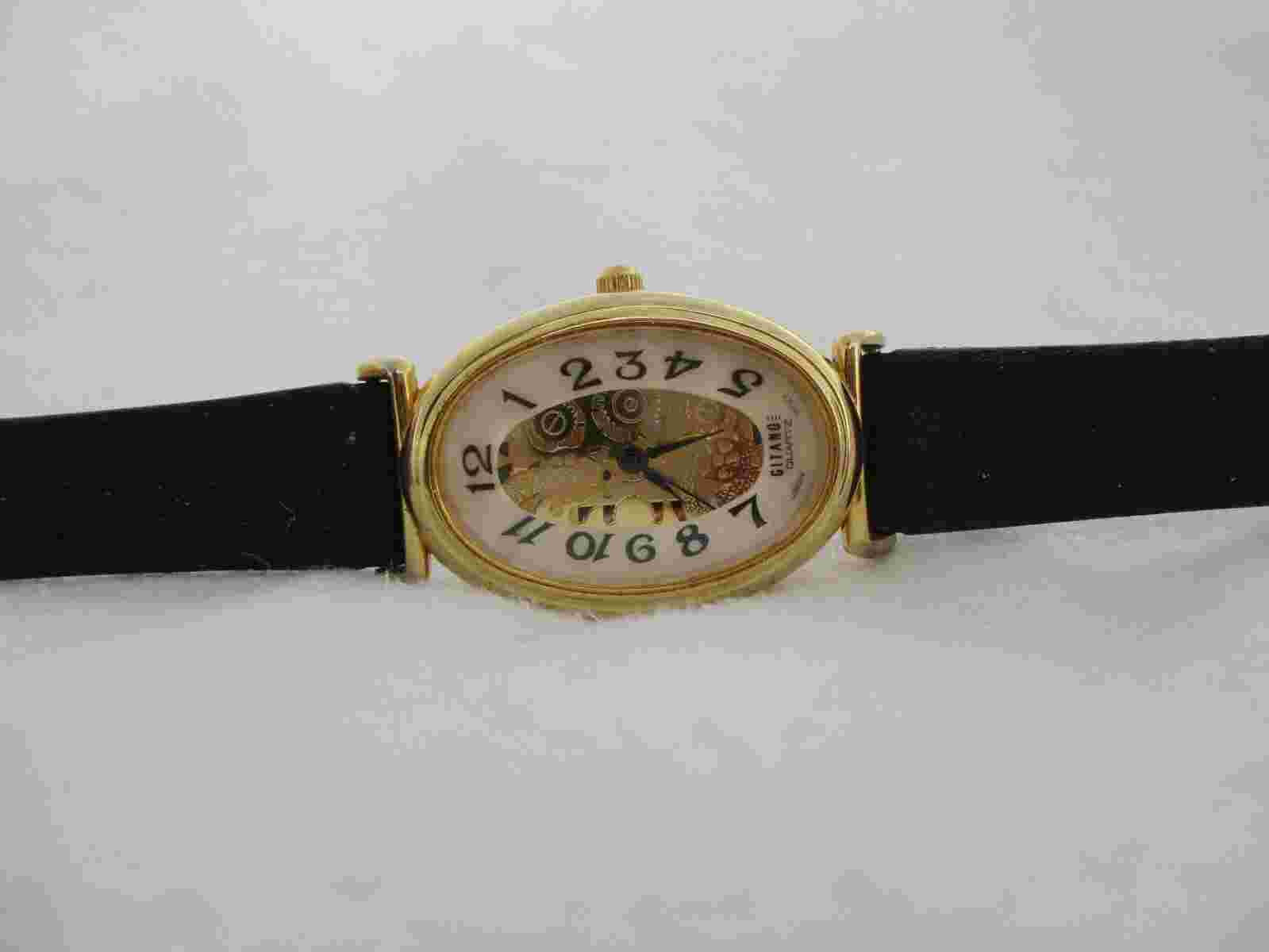 Gitano Analog Wristwatch with a Buckle Band and Quartz Movement