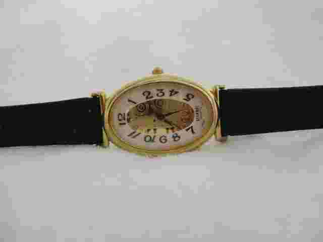 Gitano Analog Wristwatch with a Buckle Band and Quartz Movement