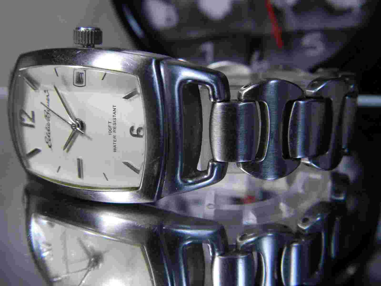 Eddie Bauer True Curvex Case WR100' 7" Date Watch. New Battery. 2 Year Warranty