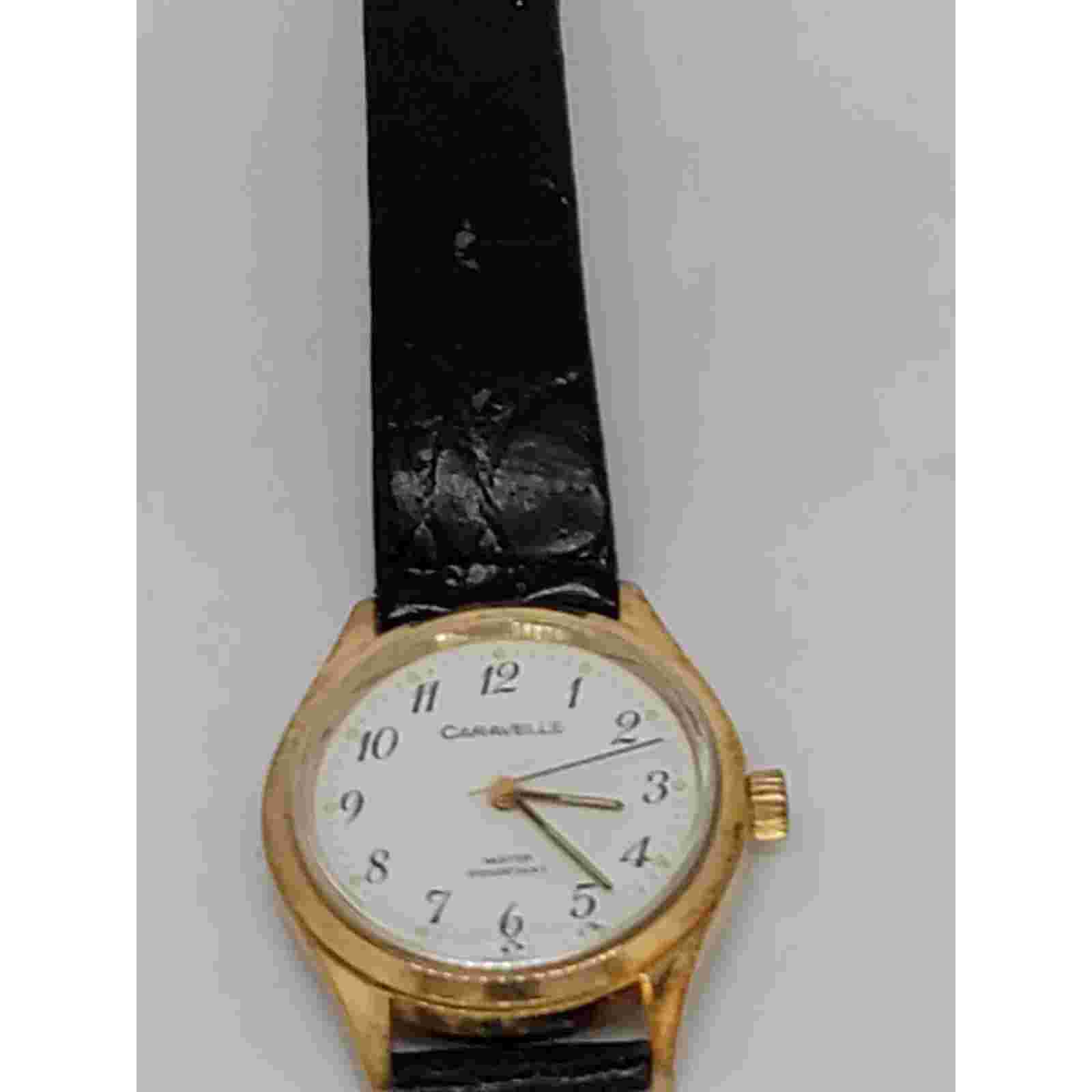 Classic Caravelle Gold-Tone Vintage Watch – Black Leather Strap, Water Resistant