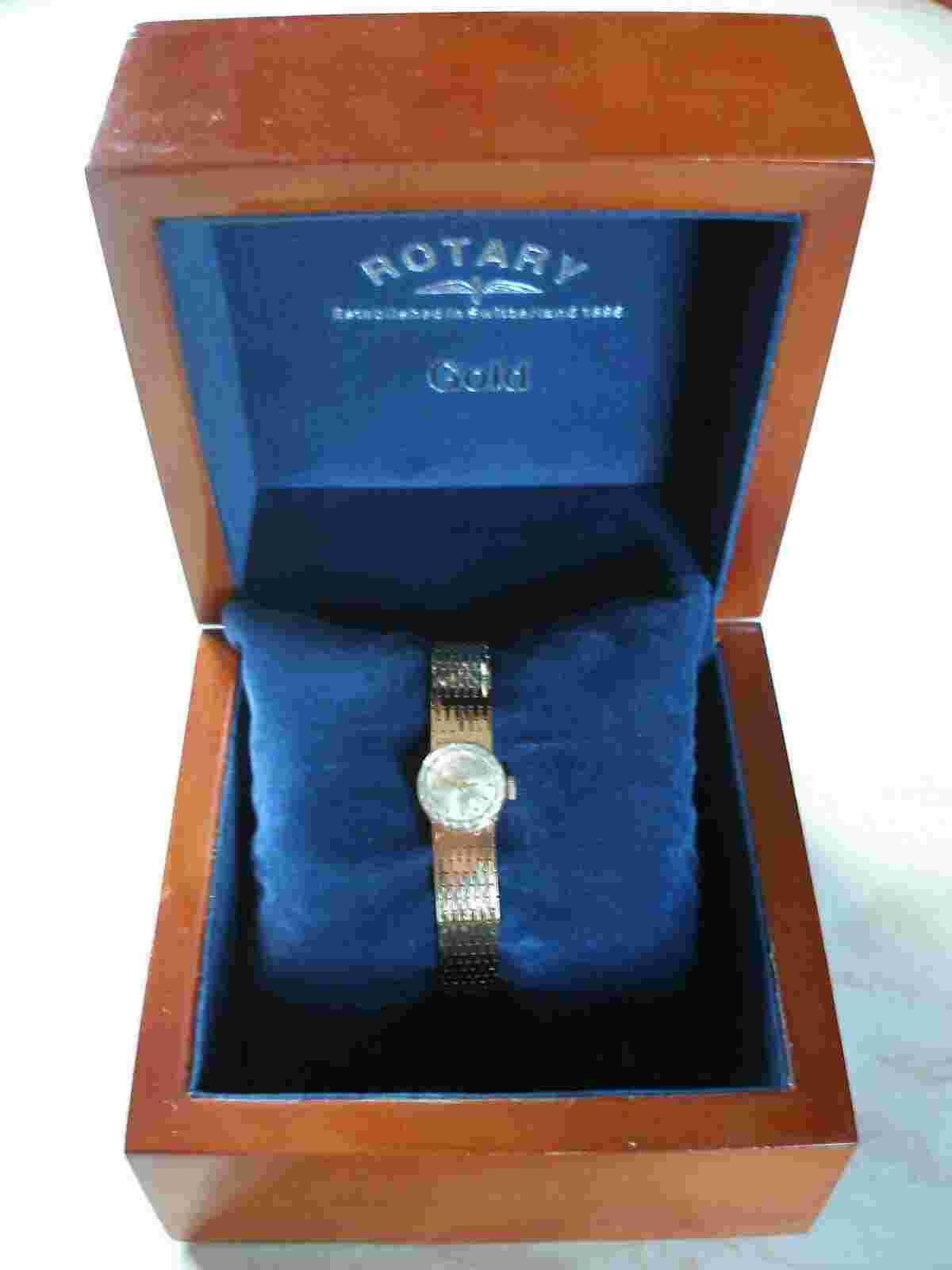 LADYS 9 CARAT GOLD ROTARY WRIST WATCH WITH AN INTEGRAL BRACELET
