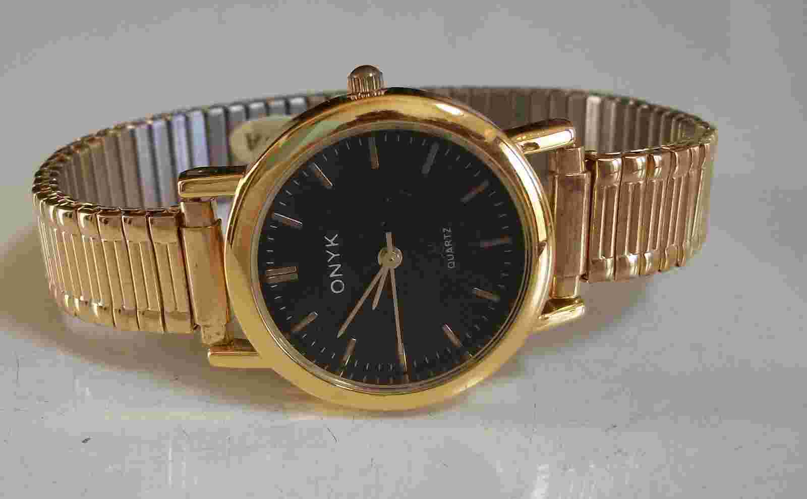 Women's black dial gold finish stretch band fashion dressy casual watch