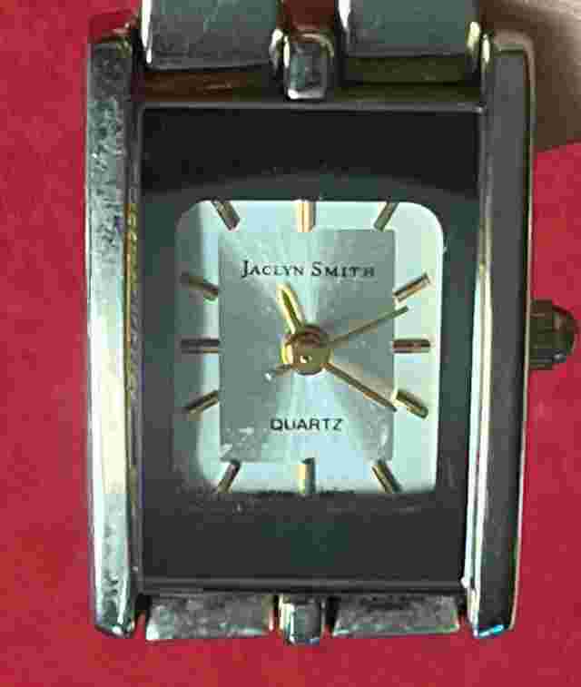 Jaclyn Smith Silver Tone Rectangle Case Bar Cut out Stretch Band Watch