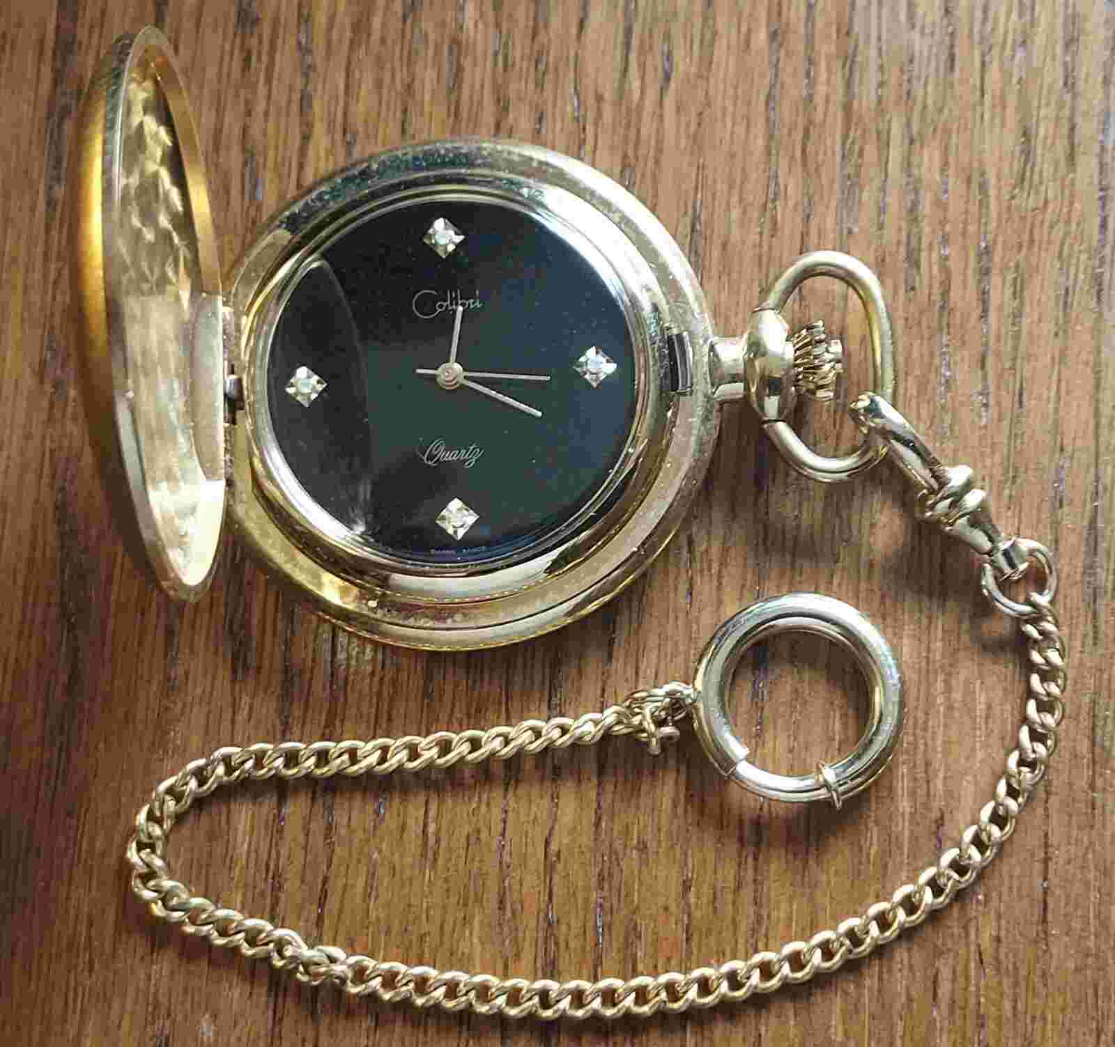 COLIBRI SWISS  GOLDTONE BLACK FACE POCKET WATCH W/4DIAMONDS