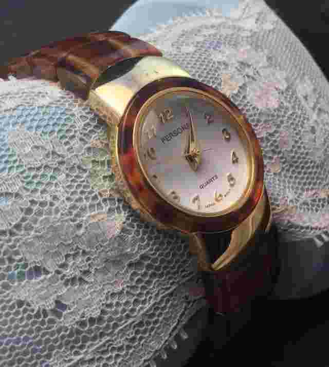 Pretty Persona Gold Tone Quartz Watch With Faux Tortoise Shell Design Cuff