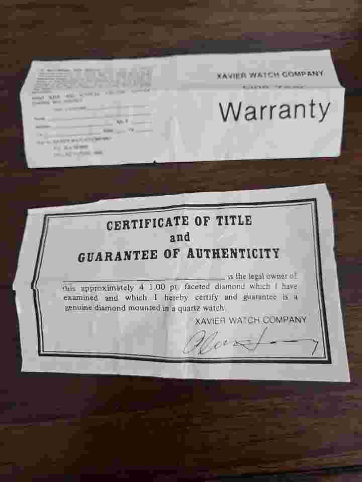 Xavier watch with black face, gold band