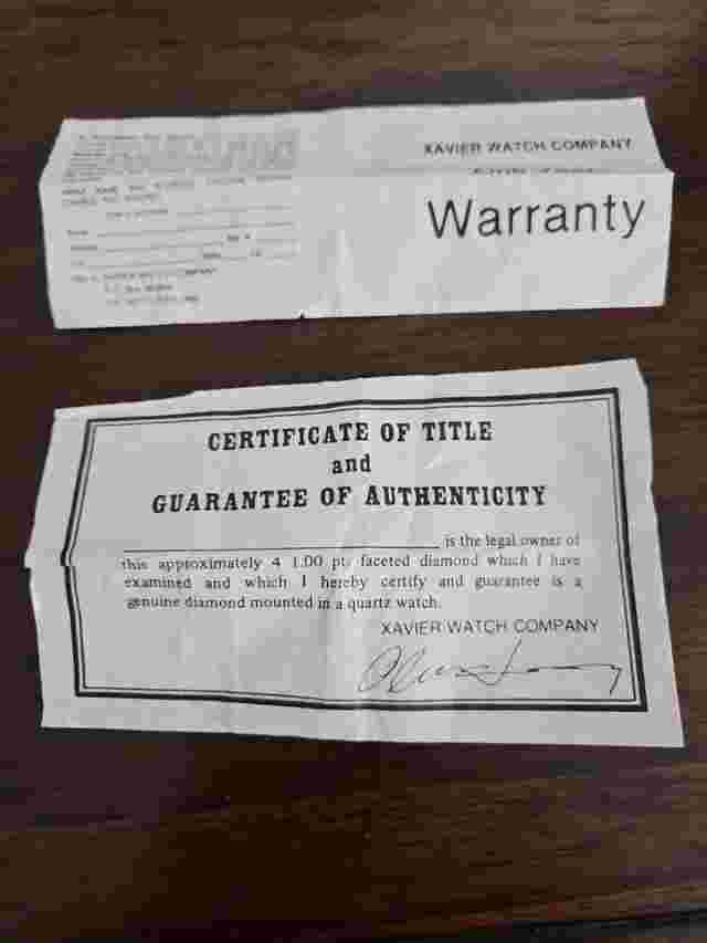 Xavier watch with black face, gold band