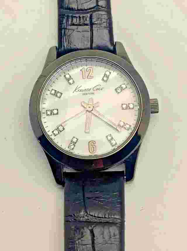 Kenneth Cole NY Women’s 28mm Quartz Watch Crystal MOP Dial Black Case Leather