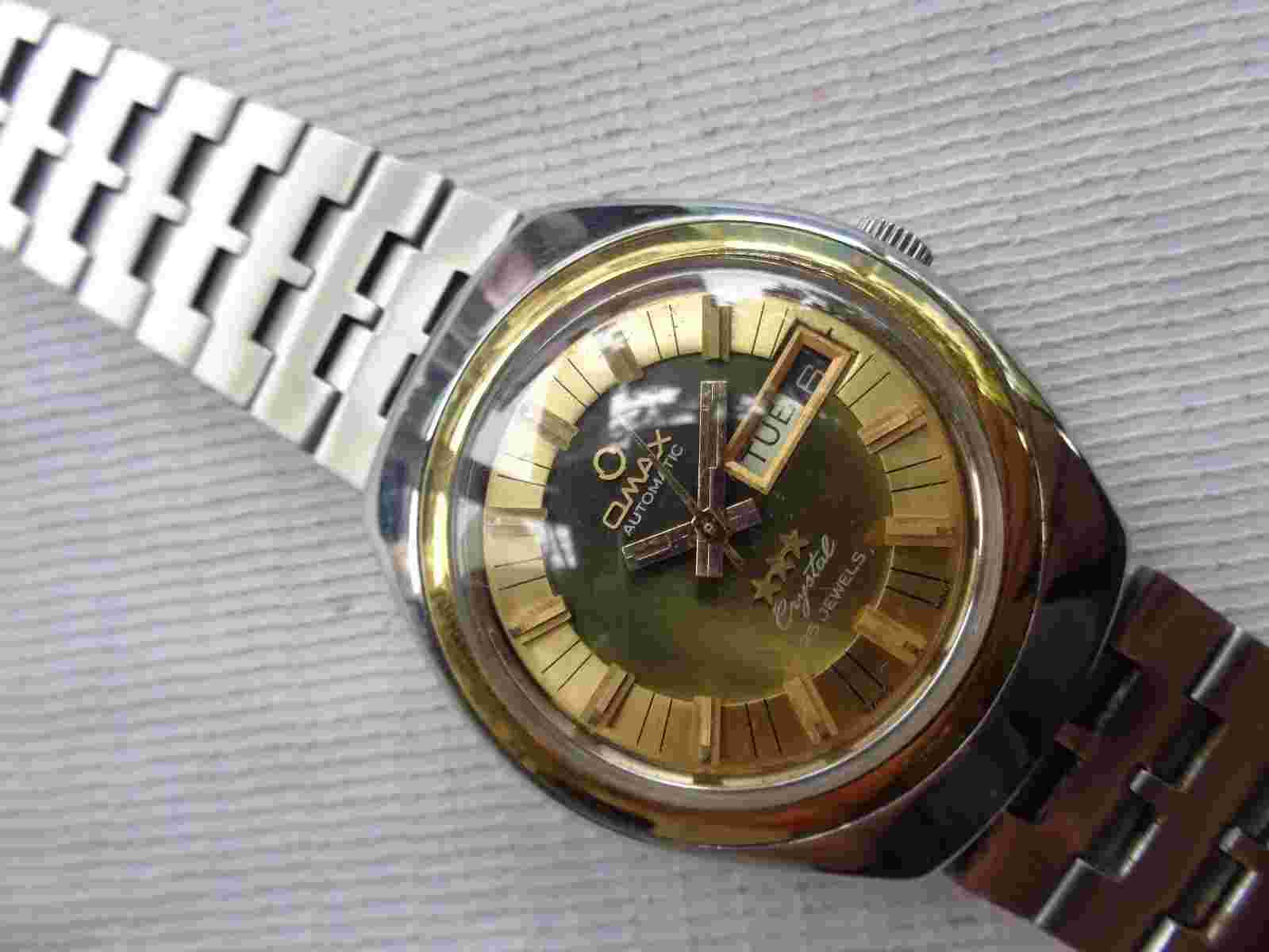 VINTAGE COLLECTIBLE TRISTAR CRYSTAL SUNBURST GREEN DIAL OMAX MEN AUTOMATIC WATCH