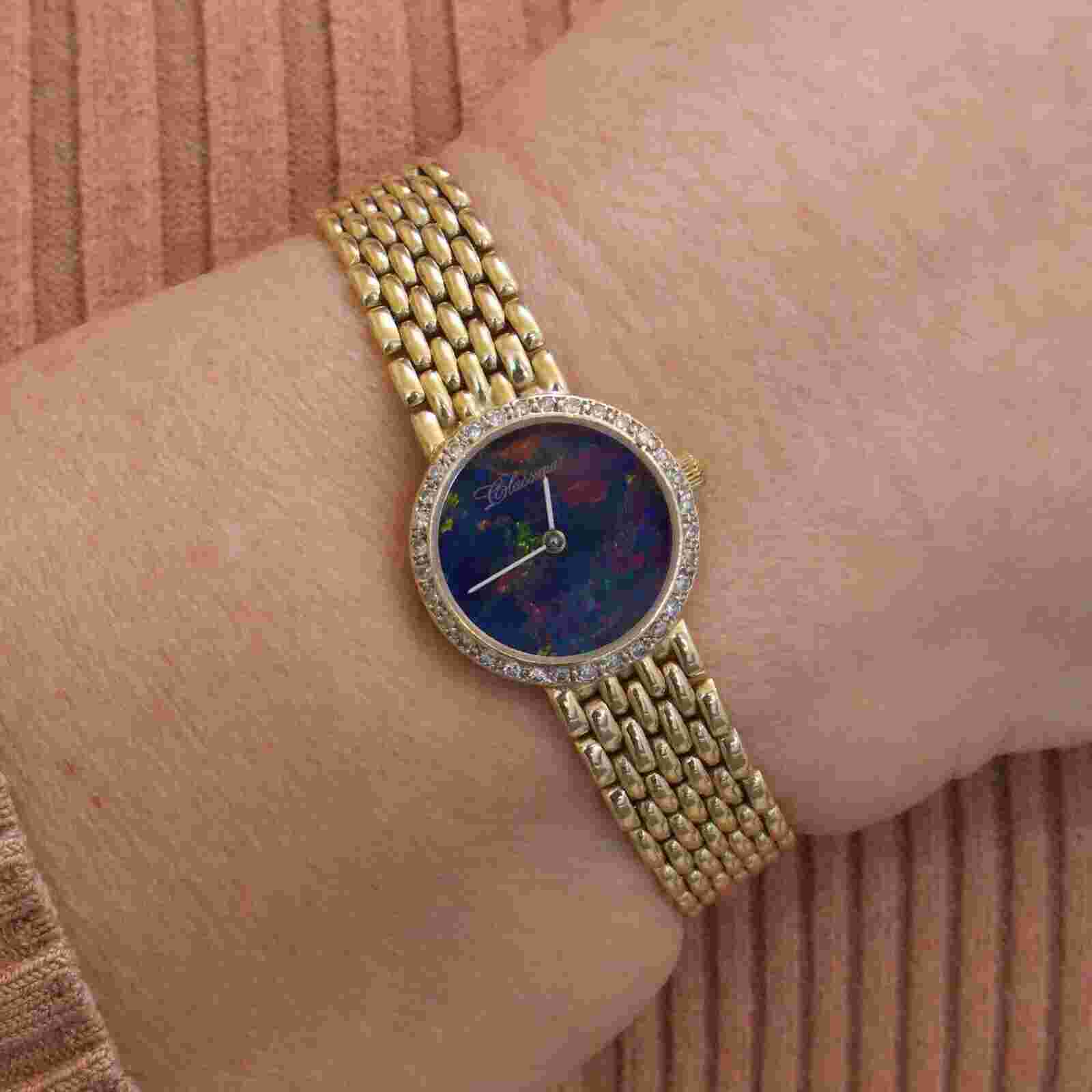 LADIES VINTAGE 14K YELLOW GOLD CLASSIQUE DIAMOND WRISTWATCH WITH BLACK OPAL DIAL