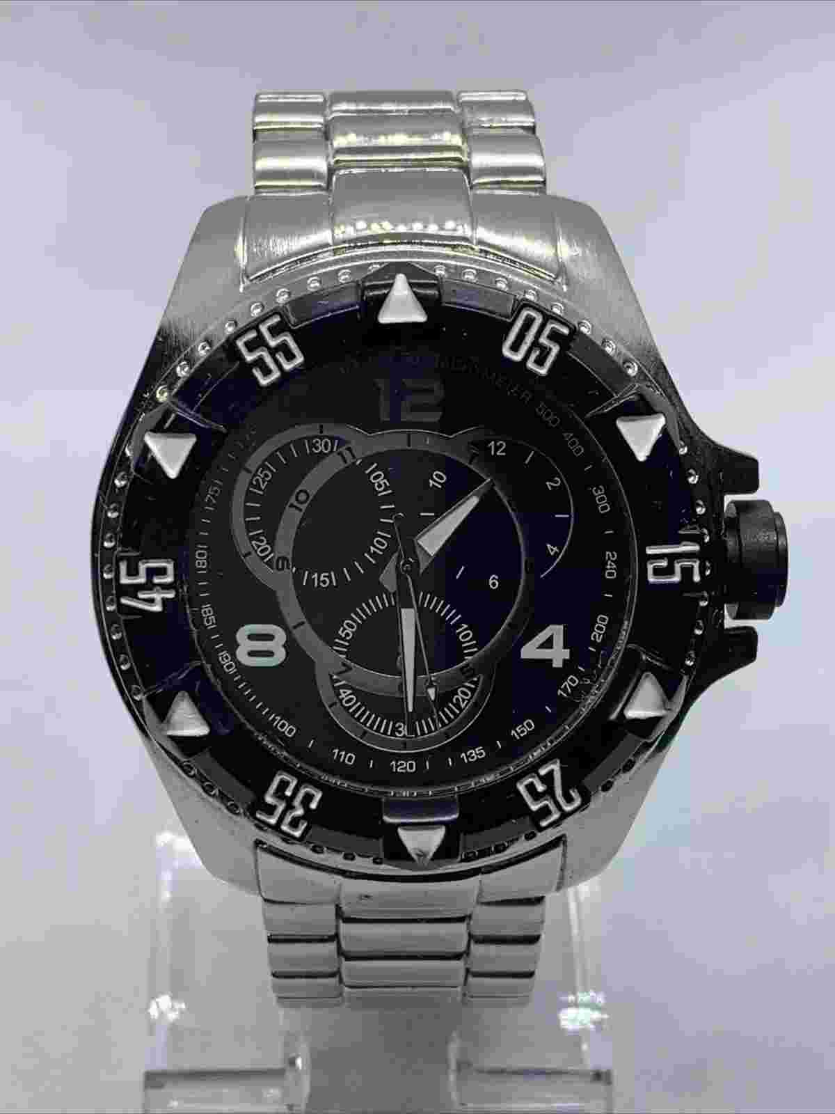 Men’s Watch.  Adjustable Band. Very Heavy.  New Battery. Stock#015
