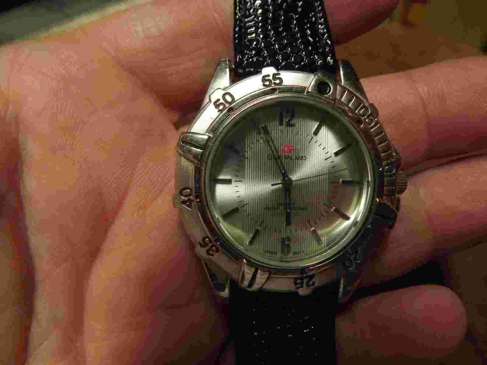 GINO MILANO WATCH #2206 USED WITH NEW BATTERY WORKS GREAT AND KEEPS GREAT TIME