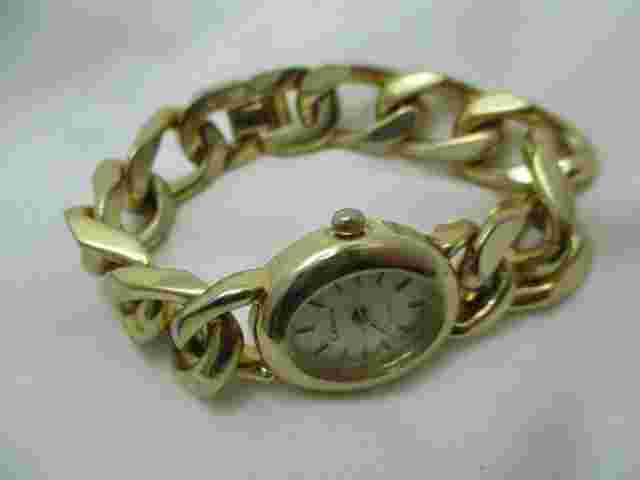 Cenere Analog Wristwatch Gold Tone Band Oval Shaped Face
