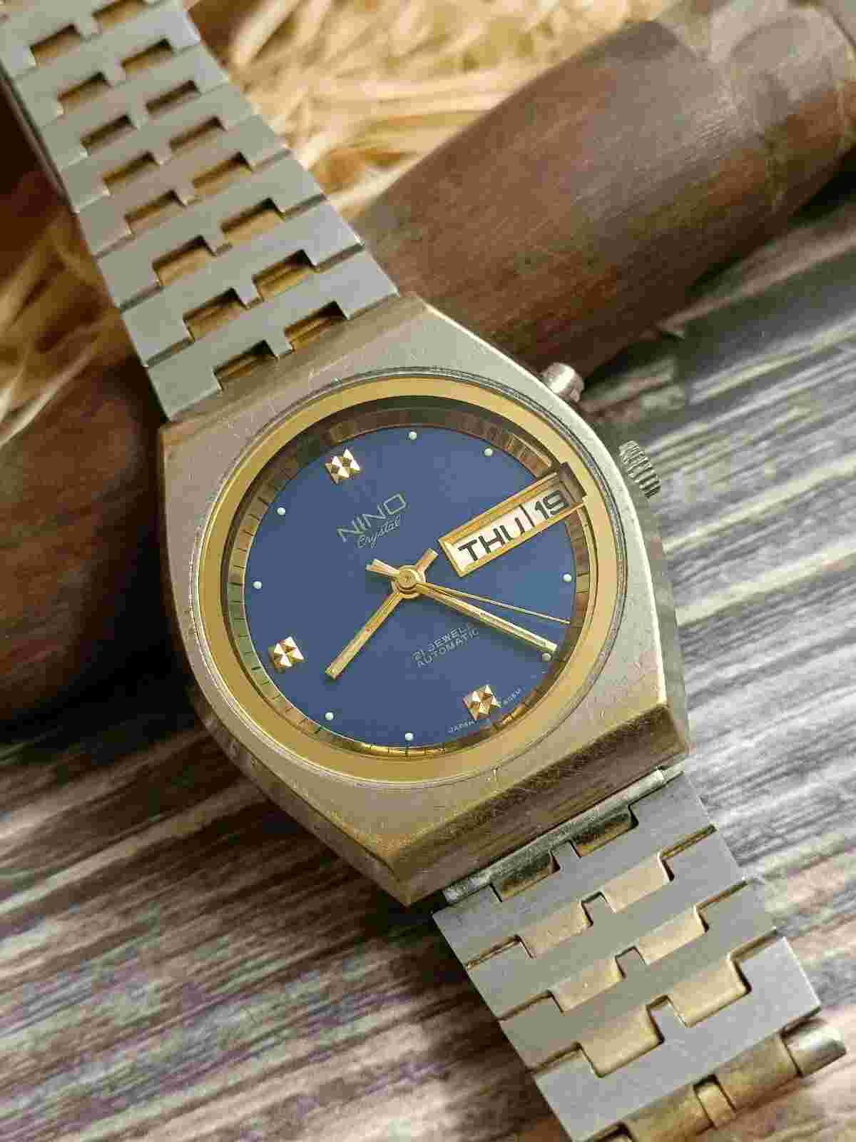 AUTHENTIC NINO CRYSTAL AUTOMATIC 21 JEWELS SWISS MENS BLUE DIAL DAY DATE VINTAGE