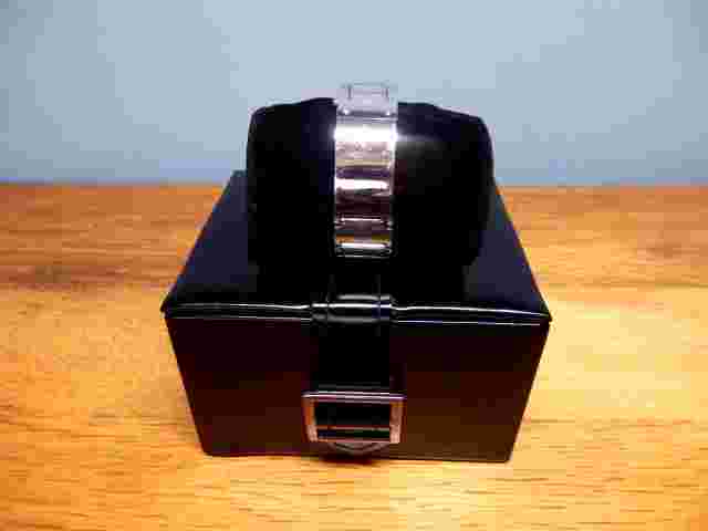 KAREN MILLEN silver rectangular watch in original box with spare link for band