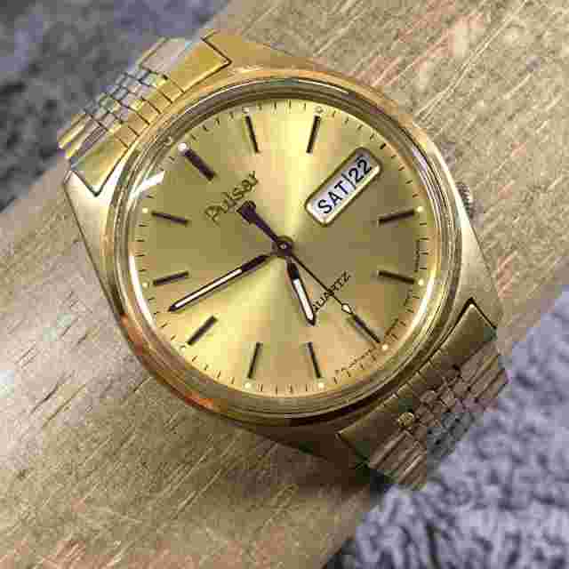 Vintage Pulsar Men Y513-8009 Day Date Gold Tone 35mm Quartz Analog Watch 7"