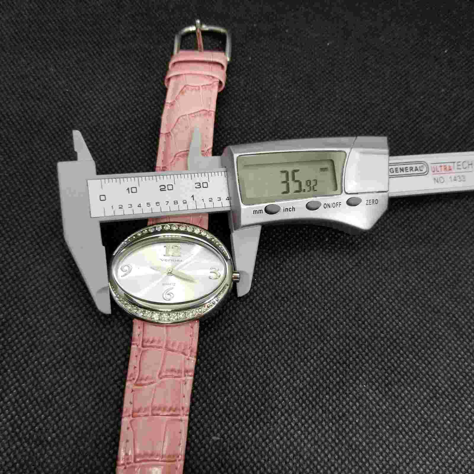 Vernier Rhinestone Bezel Oval Ladies Watch Silver Dial Quirky Pink Band 35mm