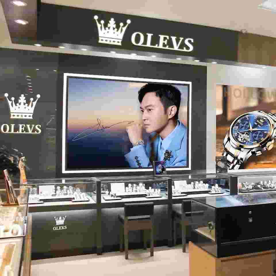 OLEVS High-Quality Women's Skeleton Watch – Ceramic Strap, Waterproof Design.