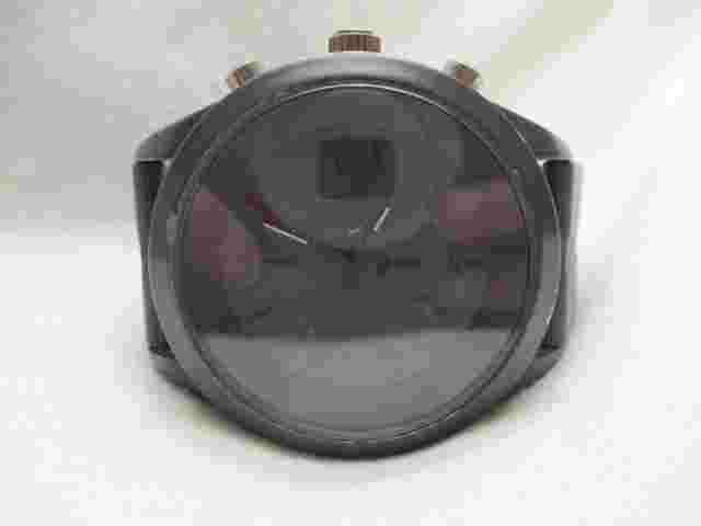 Unlisted Analog Wristwatch with a Buckle Band