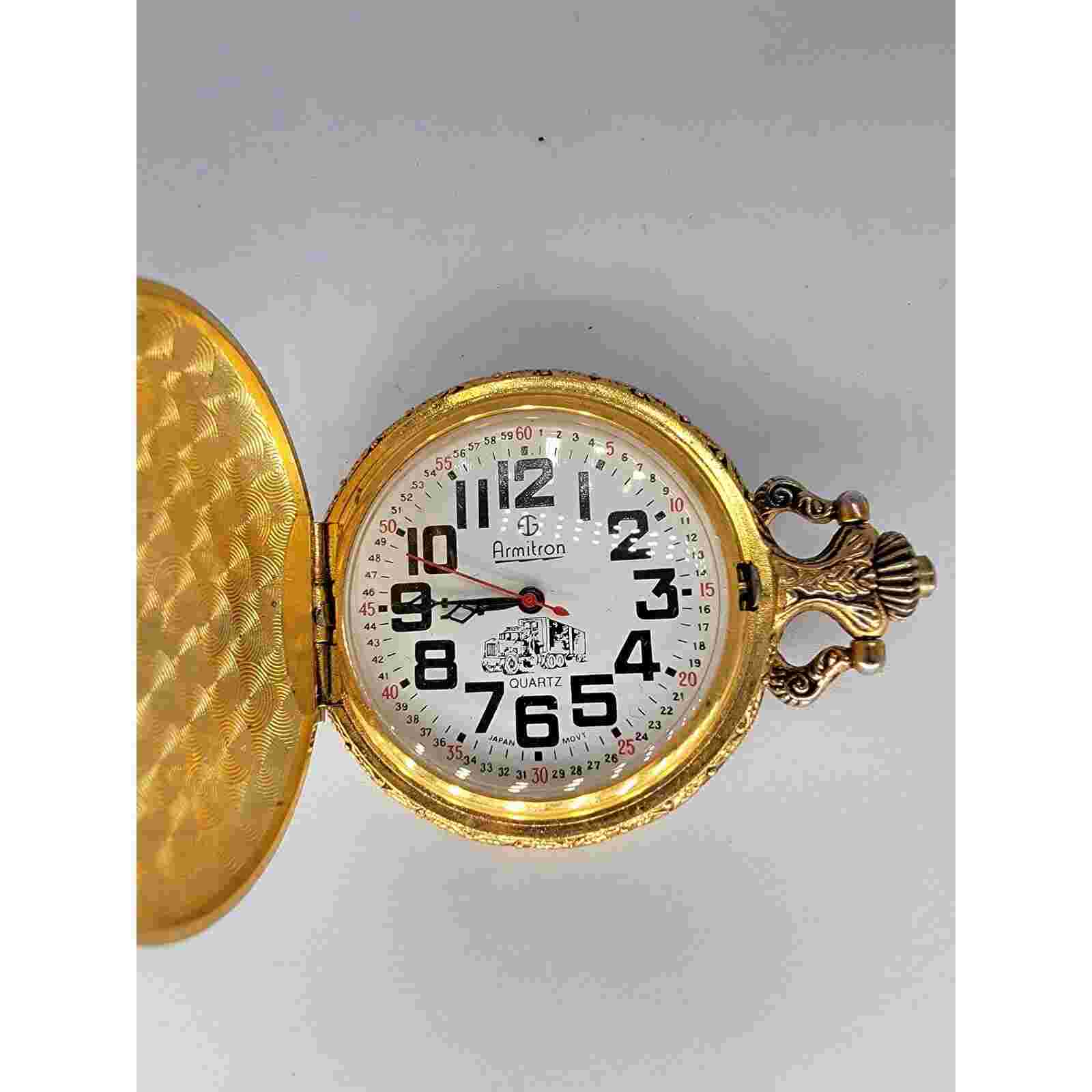 Vintage Armitron Pocket Watch with Intricate Gold Case and White Dial