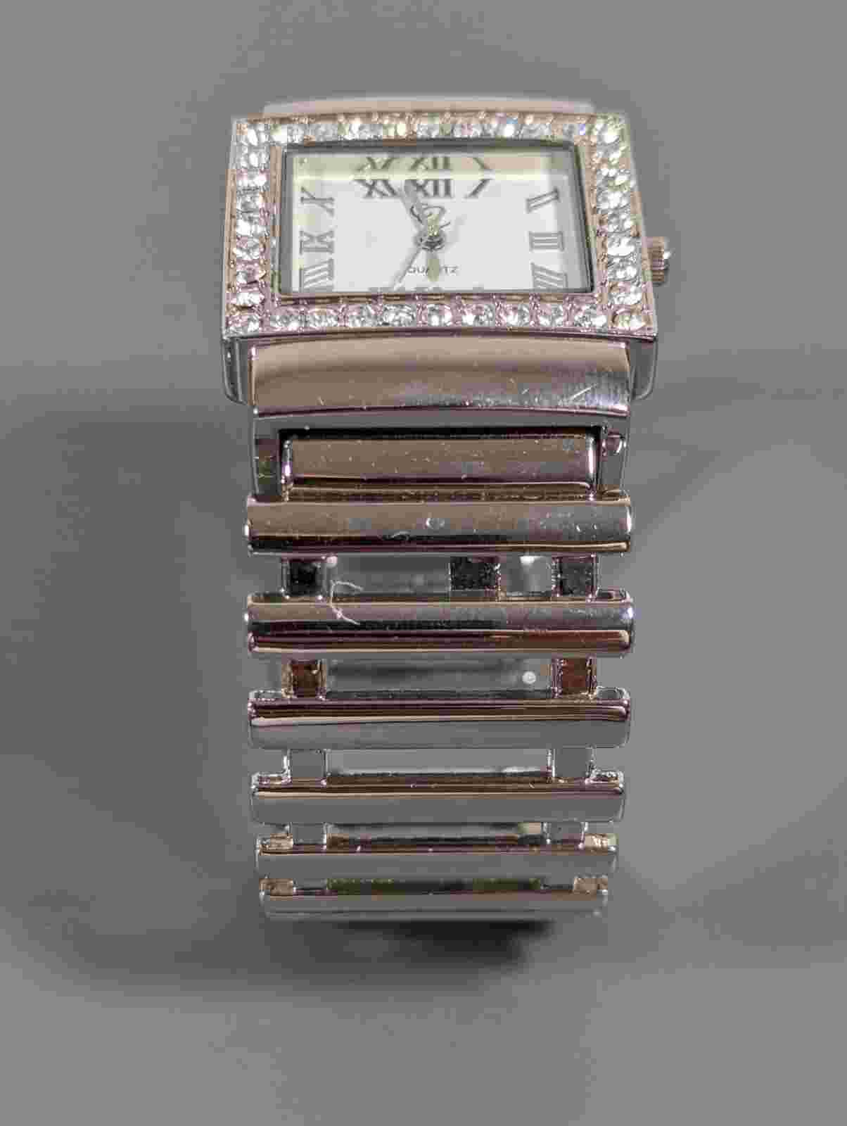 Charming Charlie White Dial Crystal Accent Silver Tone Case Hinge Bracelet Watch