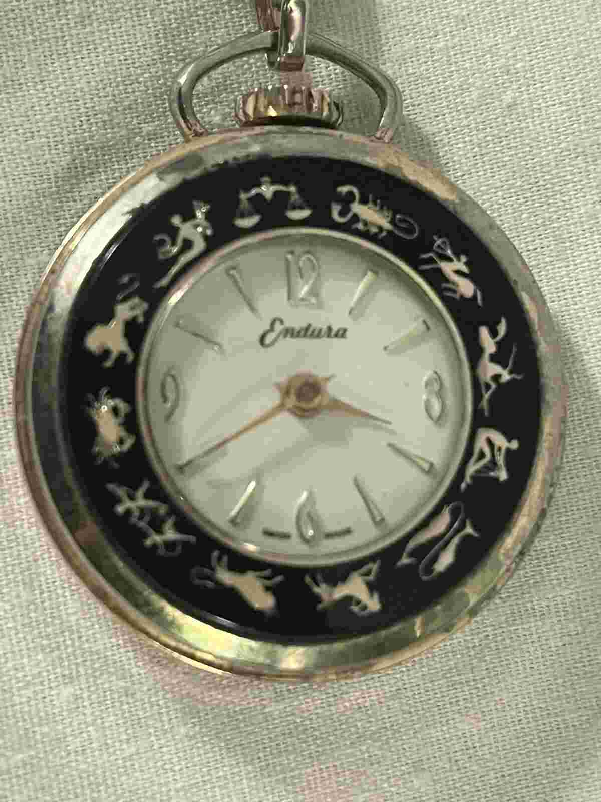 Vintage Swiss Made Endura Gold Tone Black Enamel Zodiac Pocket Watch And Chain