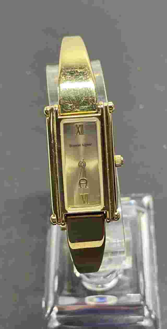 Etienne Aigner Gold Tone Horseshoe Buckle Clasp Jap Movt Watch C77155