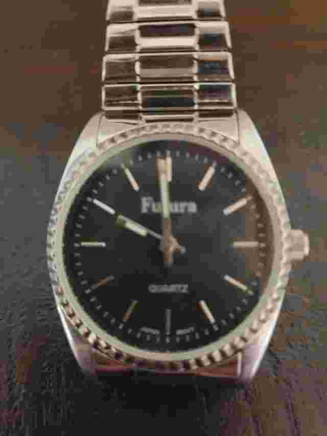 Futura Silver Tone Quartz wristwatch for parts not working