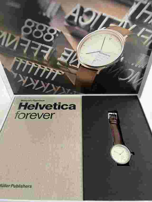 Mondaine Helvetica Self-Winder in Unique presentation box with a book